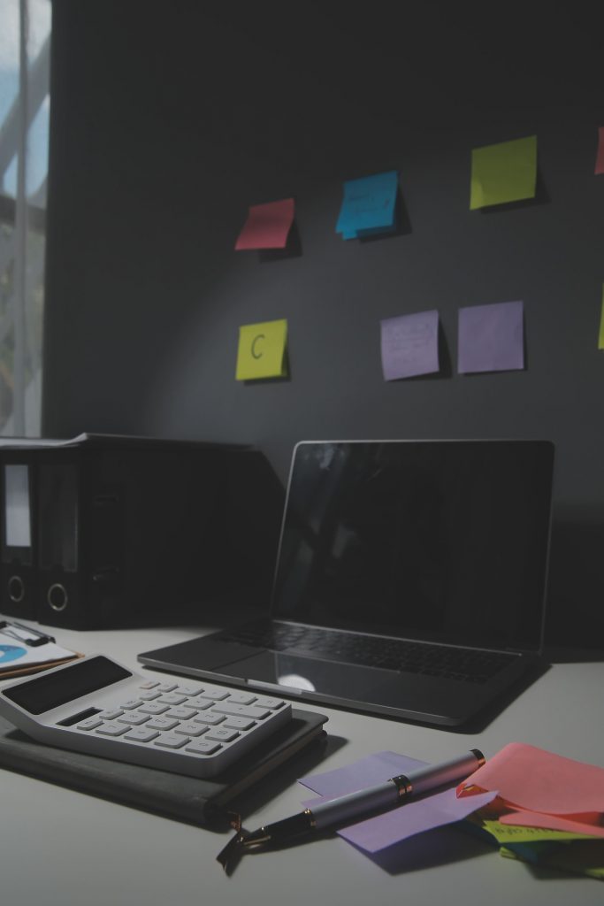 vecteezy_studio-workspace-with-laptop-computer-and-office-supplies_46671315